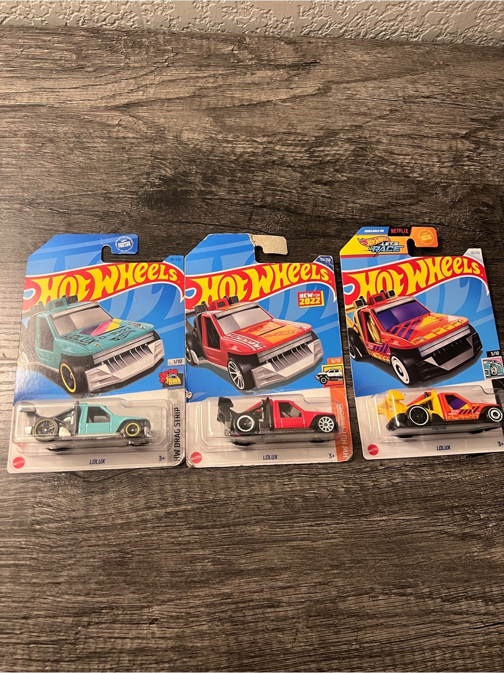 Hot Wheels LOLUX Bundle Lot of 3 Die-Cast Trucks Red Teal Orange